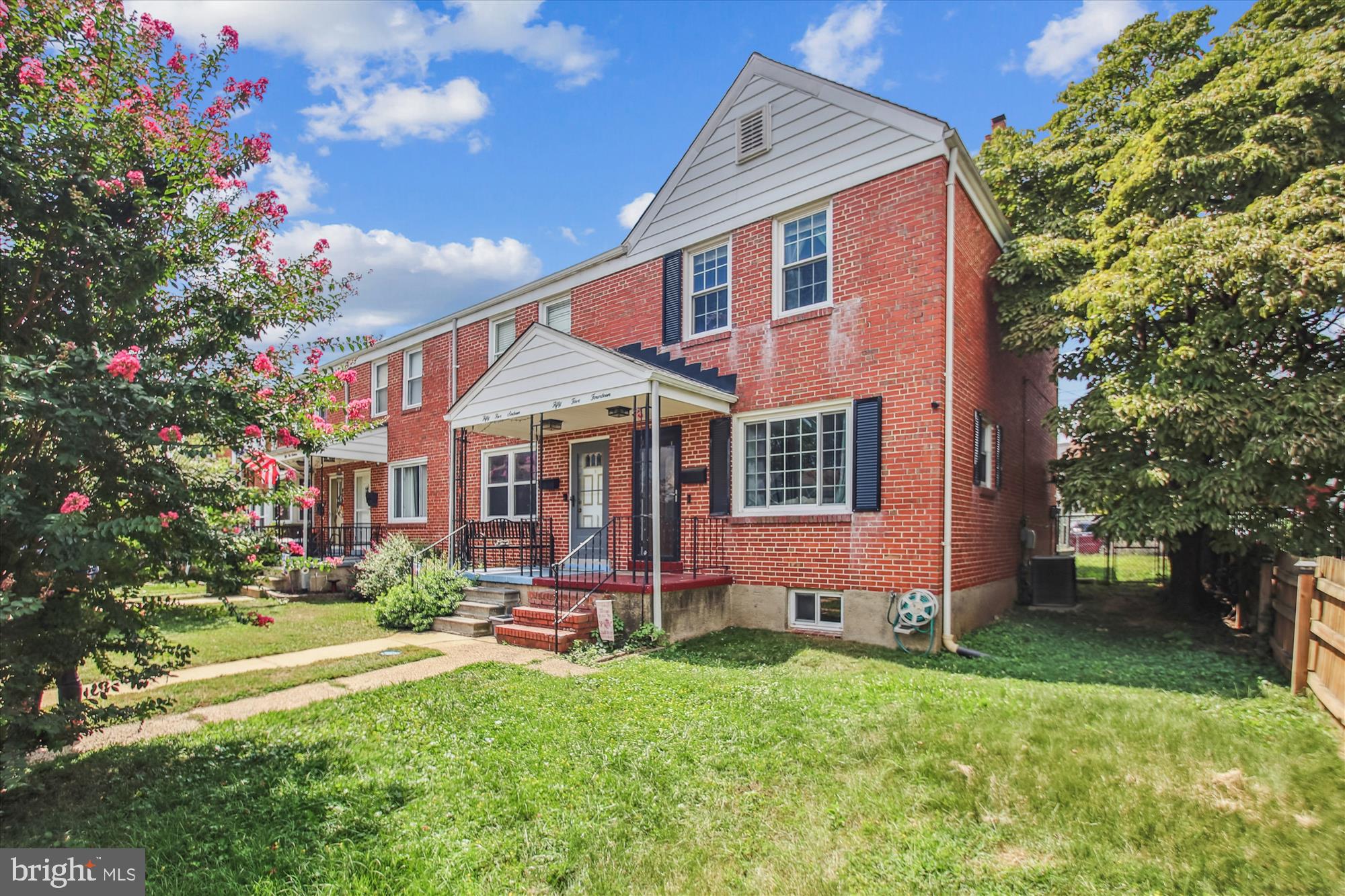 5514 Council Street Halethorpe, MD 21227 - Photo 29 of 36 a front view of a house with garden