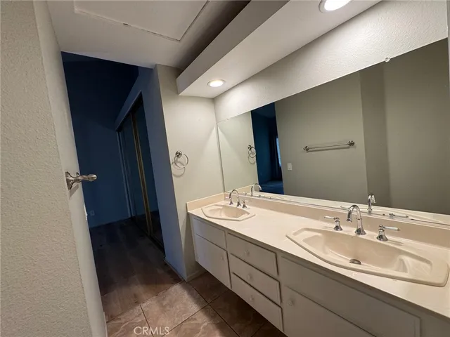 a bathroom with a toilet and a bath tub