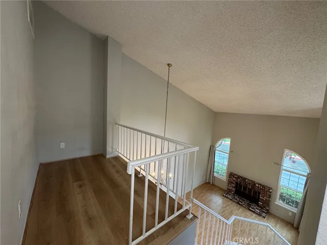 a kitchen with stainless steel appliances granite countertop a sink and a stove