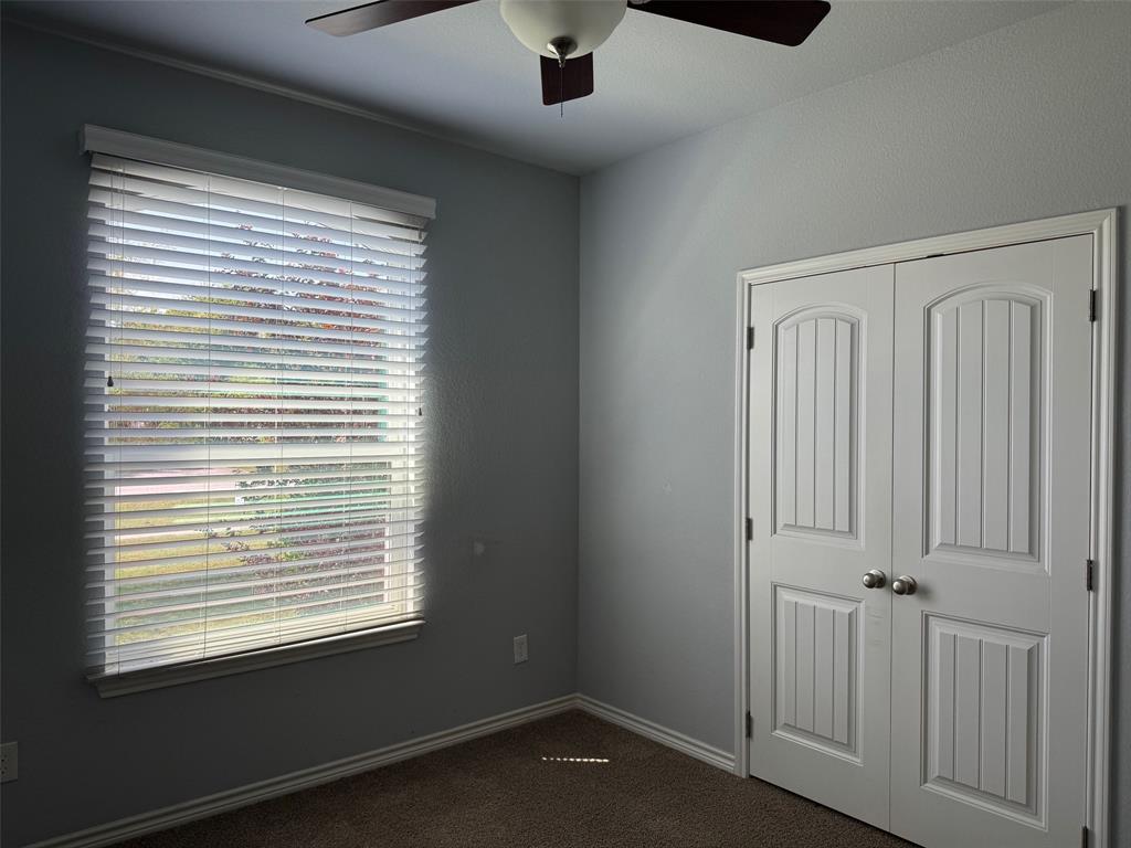 792 East Northside Drive Pilot Point, TX 76258 - Photo 15 of 18 a view of an empty room with a window
