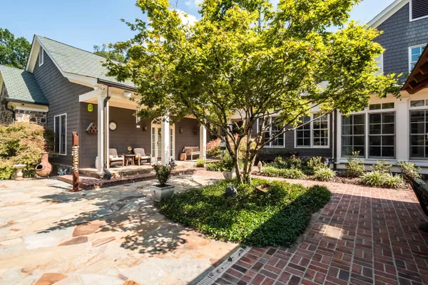 a view of a house with a patio