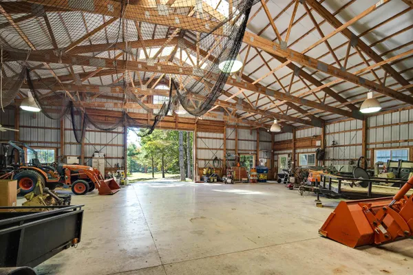 a view of parking garage with cars