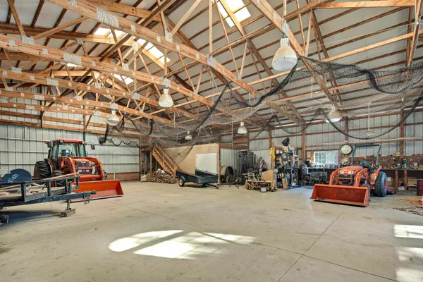 a view of parking garage with cars