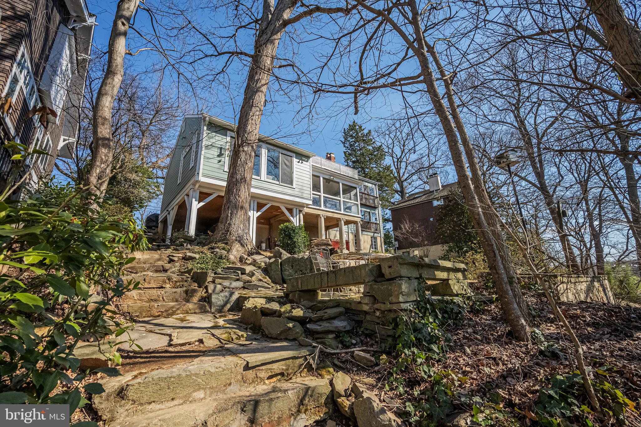 a view of a building with a yard