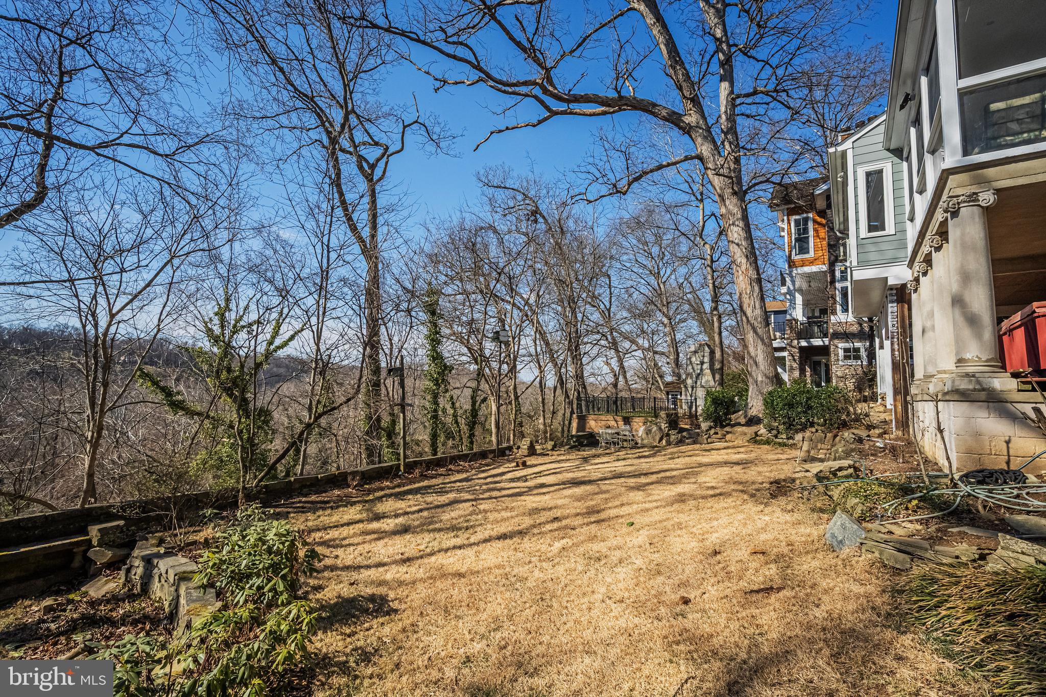 6280 Ridge Drive Bethesda, MD 20816 - Photo 12 of 27 a backyard of a house with large trees