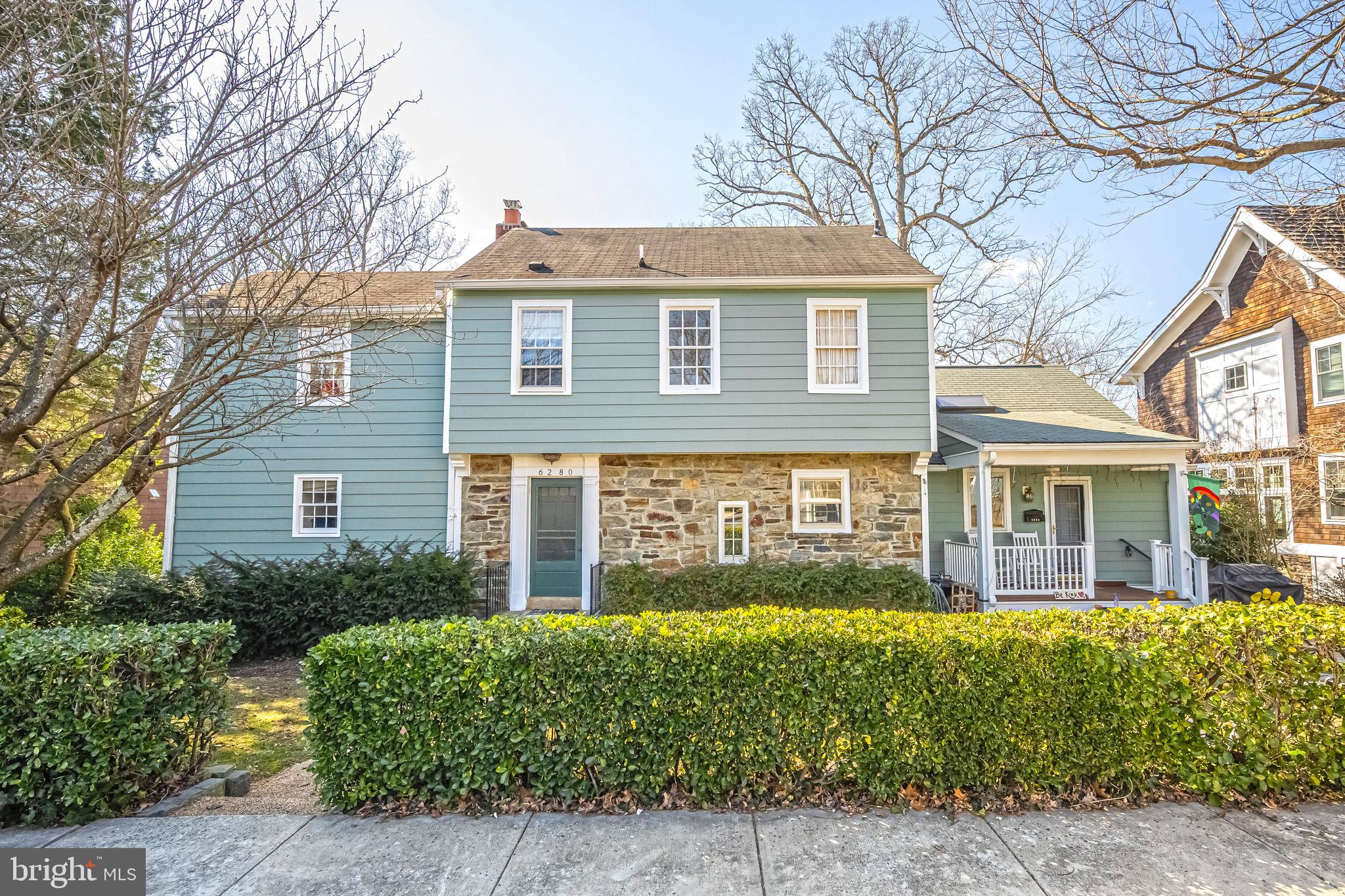 6280 Ridge Drive Bethesda, MD 20816 - Photo 16 of 27 a front view of a house with a yard