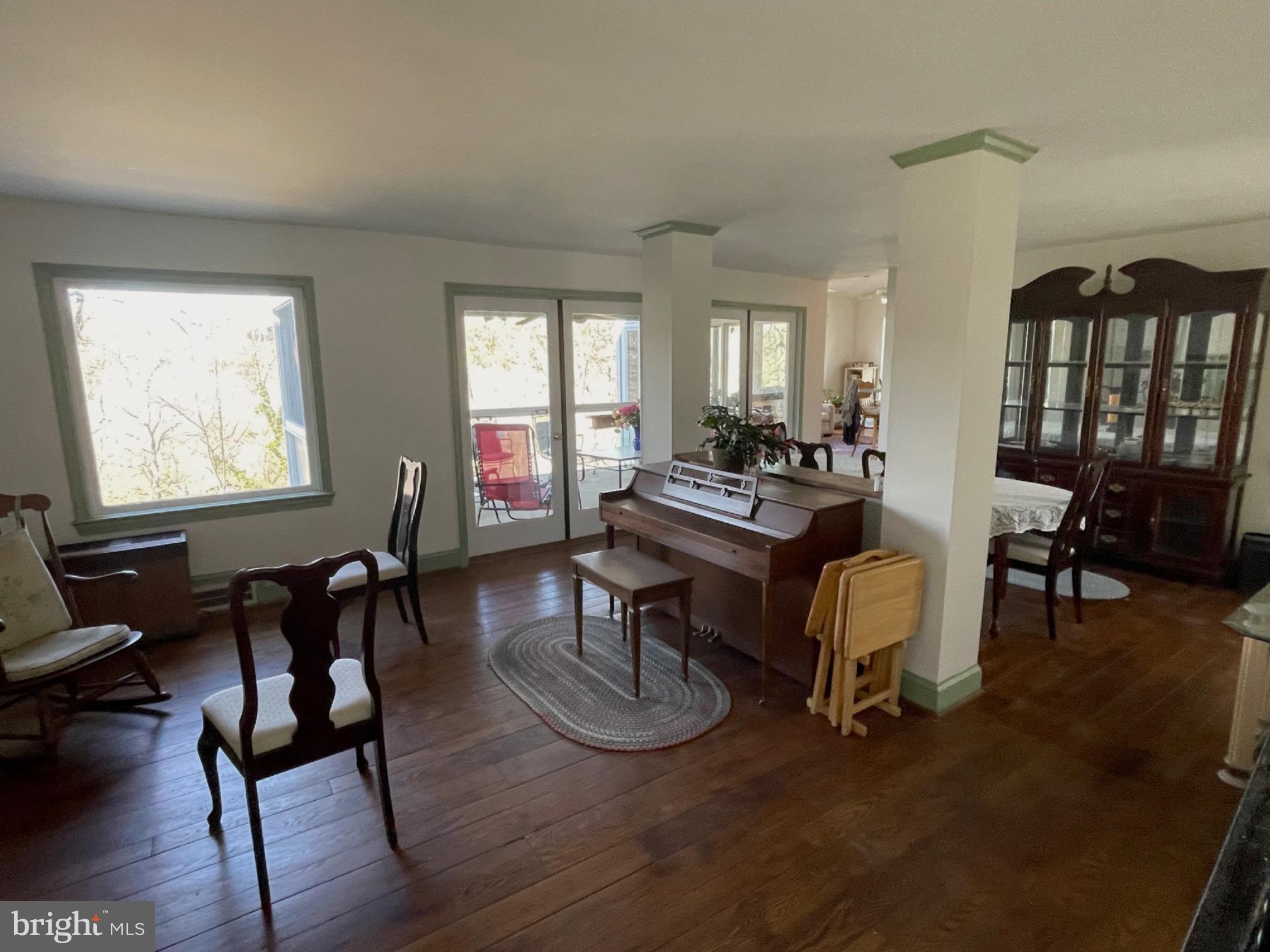 6280 Ridge Drive Bethesda, MD 20816 - Photo 20 of 27 a living room with fireplace furniture and a wooden floor