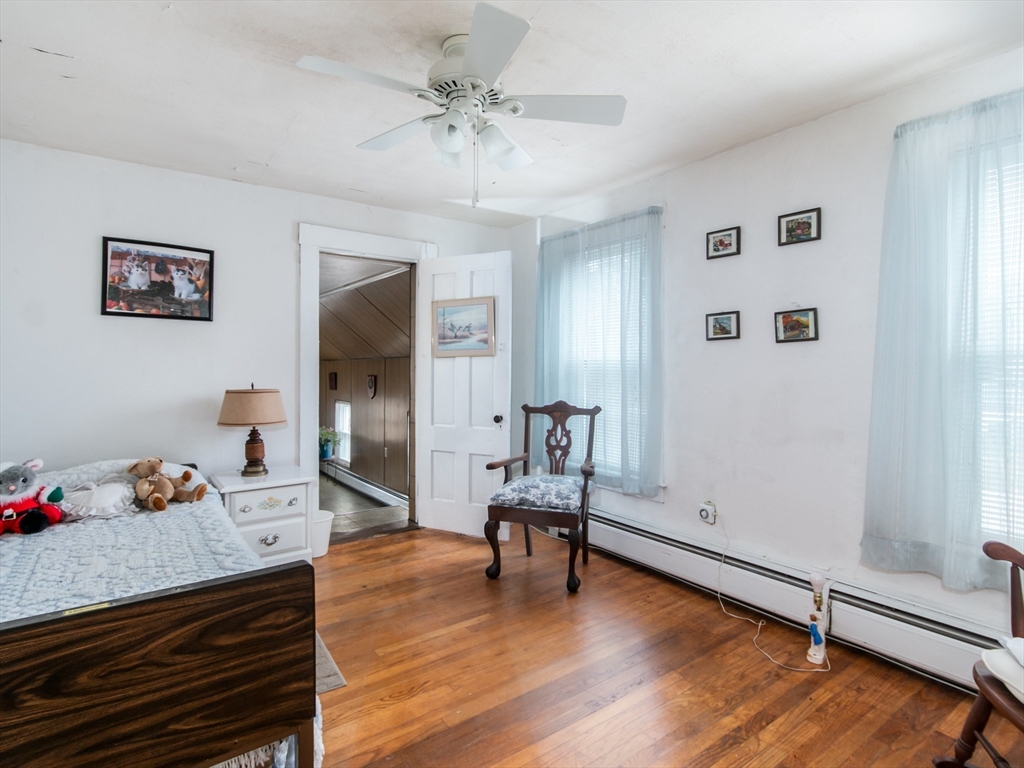 68 Durham Road Dover, NH 03820 - Photo 14 of 23 a living room with furniture and wooden floor