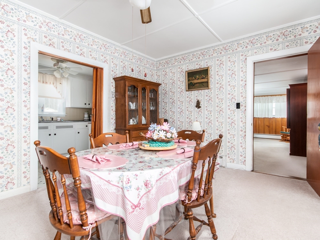 68 Durham Road Dover, NH 03820 - Photo 2 of 23 a dining room with furniture and window