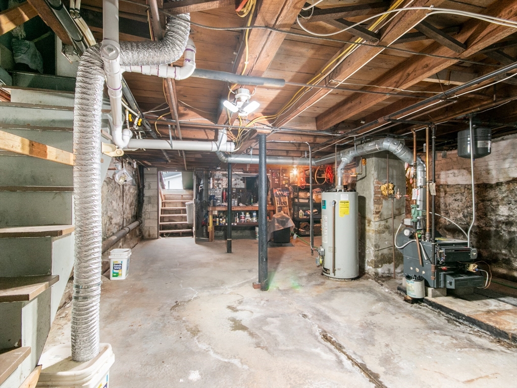 68 Durham Road Dover, NH 03820 - Photo 21 of 23 a view of a garage with chairs