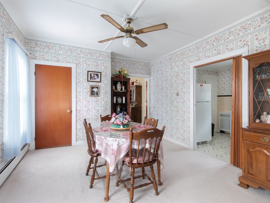 68 Durham Road Dover, NH 03820 - Photo 5 of 23 a dining room with furniture and window