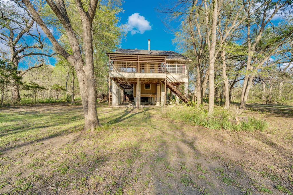 488 Loma Linda Road Palmer, TX 75152 - Photo 4 of 39 a view of a house with a yard