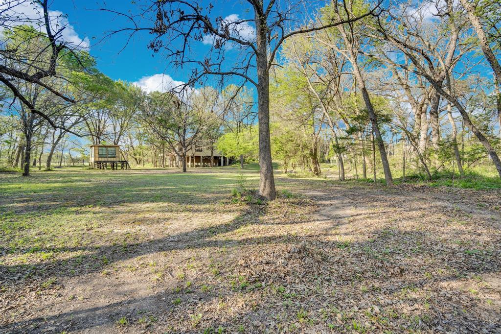 488 Loma Linda Road Palmer, TX 75152 - Photo 9 of 39 a view of a park with swings and slides