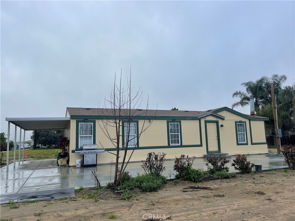 33137 Haddock Street Winchester, CA 92596 - Photo 2 of 32 a front view of a house with garden