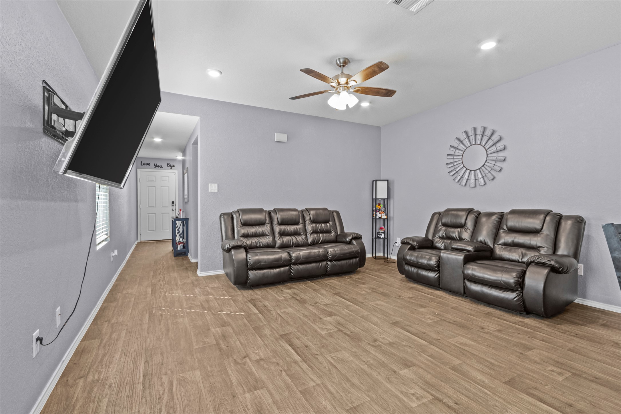 339 Euclid Lane Kyle, TX 78640 - Photo 5 of 17 a living room with furniture and a wooden floor