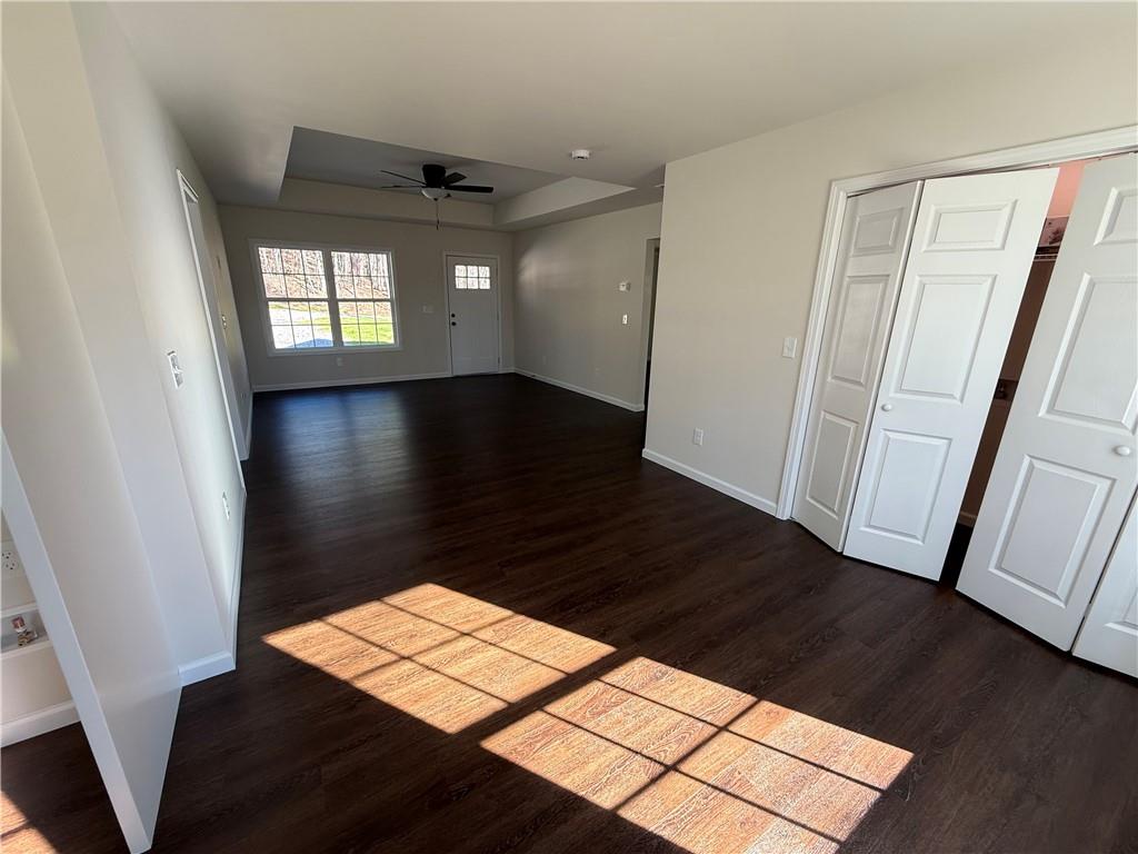 275 Red Oak Flats Road Dahlonega, GA 30533 - Photo 4 of 16 a view of an empty room with wooden floor and a window