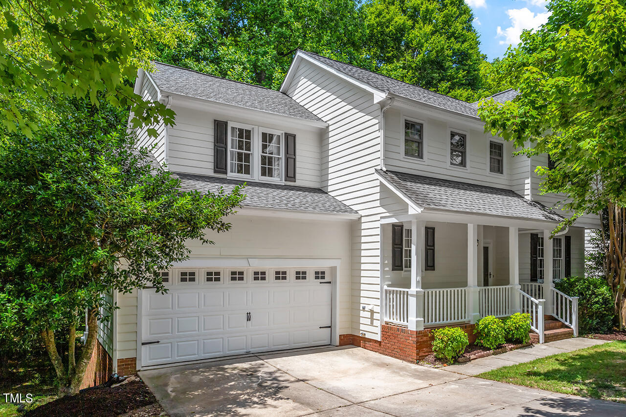 12601 Waterlow Park Lane Raleigh, NC 27614 - Photo 1 of 38 a front view of a house with a garage