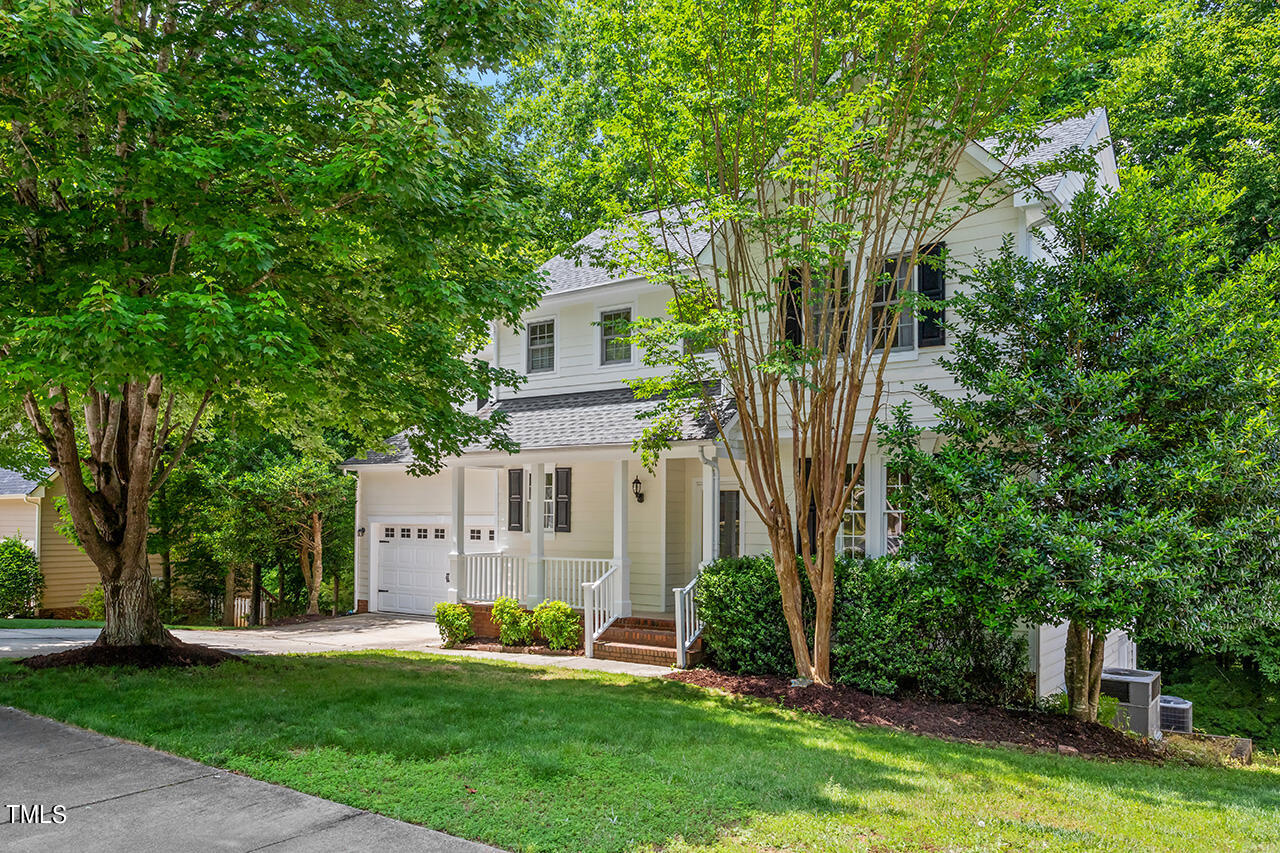 12601 Waterlow Park Lane Raleigh, NC 27614 - Photo 2 of 38 a view of a house with backyard and garden