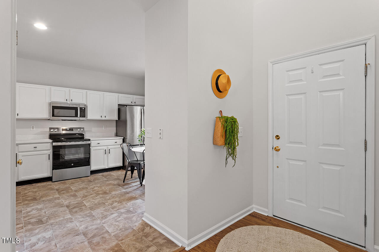 12601 Waterlow Park Lane Raleigh, NC 27614 - Photo 3 of 38 a view of a kitchen with a sink