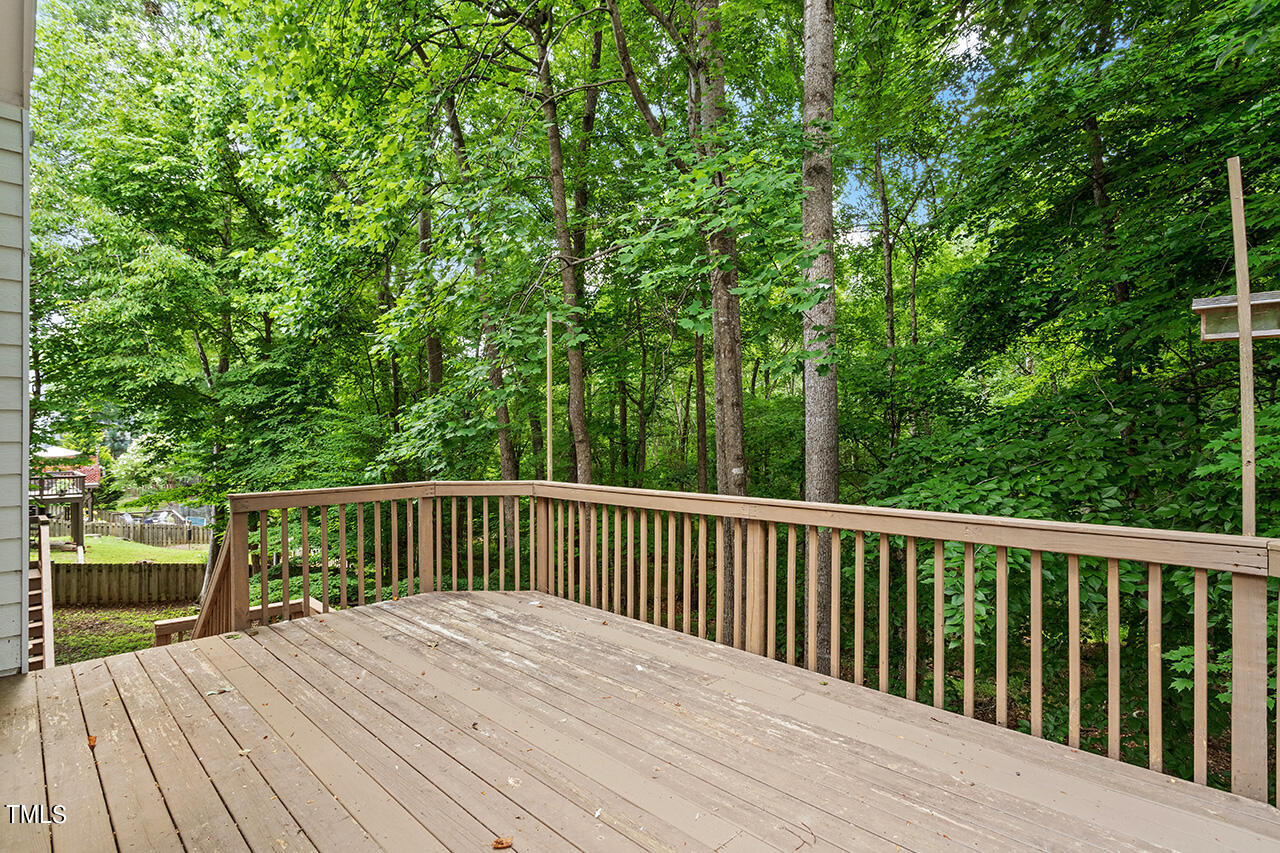 12601 Waterlow Park Lane Raleigh, NC 27614 - Photo 33 of 38 a view of balcony with wooden floor and fence