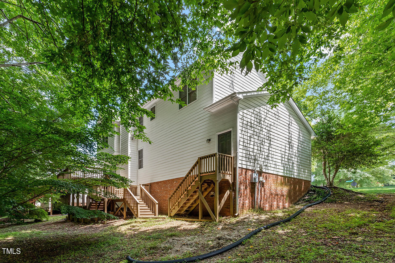 12601 Waterlow Park Lane Raleigh, NC 27614 - Photo 36 of 38 a view of backyard with a deck