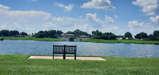 a view of a bench in a garden