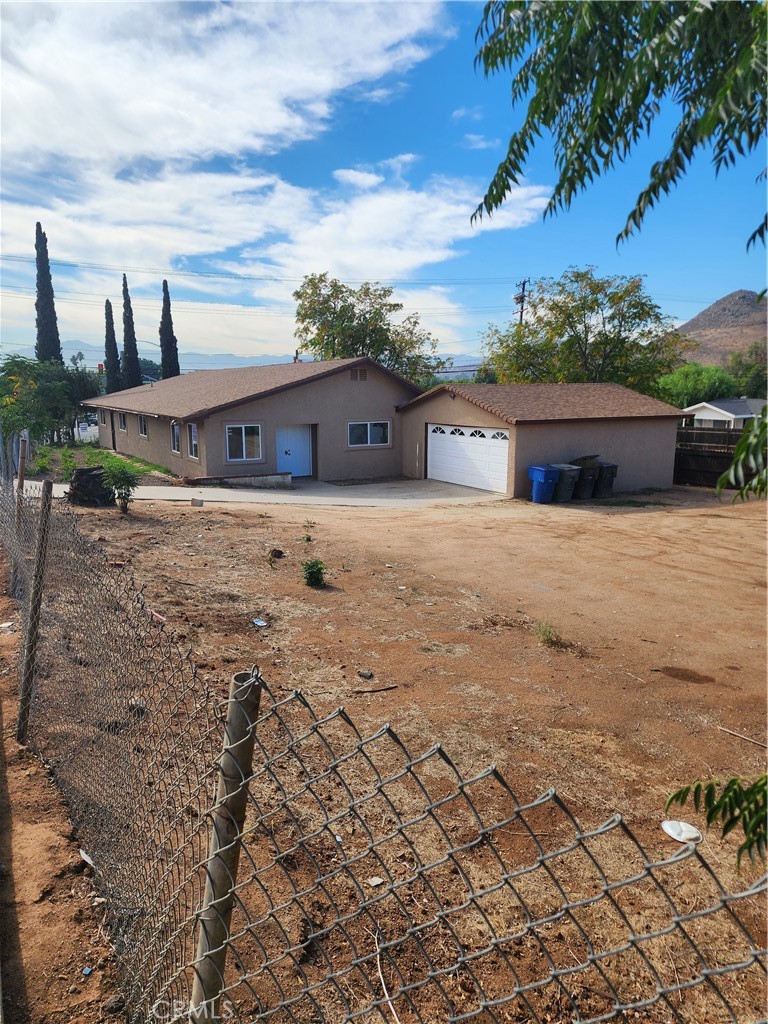6420 Stover Avenue Riverside, CA 92505 - Photo 11 of 13 a front view of a house with a yard
