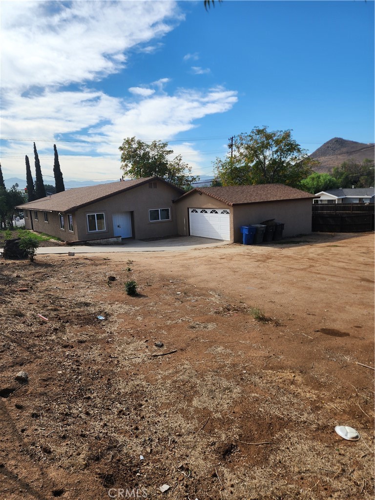 6420 Stover Avenue Riverside, CA 92505 - Photo 12 of 13 a front view of a house with a yard