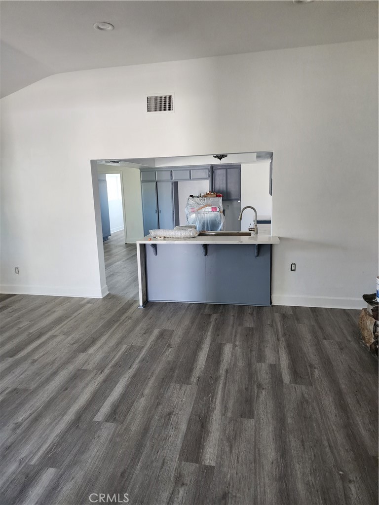 6420 Stover Avenue Riverside, CA 92505 - Photo 5 of 13 a view of kitchen and wooden floor