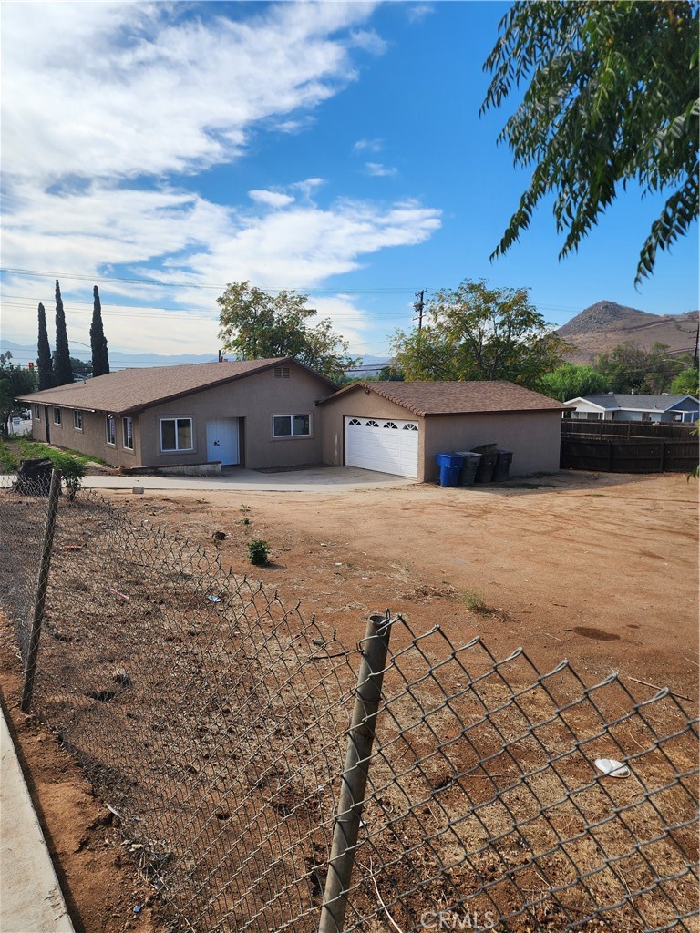 6420 Stover Avenue Riverside, CA 92505 - Photo 10 of 13 a view of a terrace with a bench