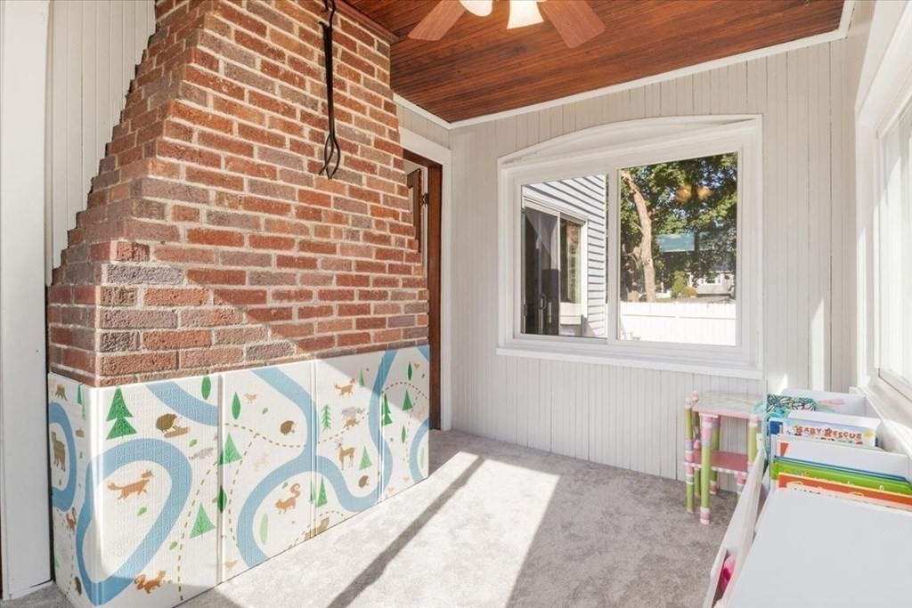 35 Clinton Road Weymouth, MA 02189 - Photo 18 of 37 a bathroom with a bathtub and a window