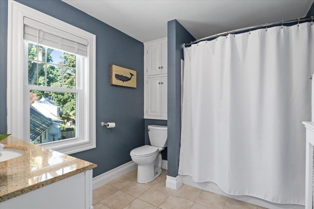 35 Clinton Road Weymouth, MA 02189 - Photo 29 of 37 a bathroom with a granite countertop sink and a mirror