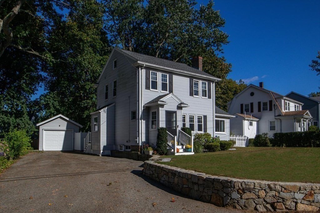35 Clinton Road Weymouth, MA 02189 - Photo 3 of 37 a front view of a house with a yard