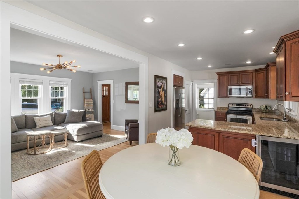 35 Clinton Road Weymouth, MA 02189 - Photo 10 of 37 a living room with stainless steel appliances furniture a dining table and kitchen view