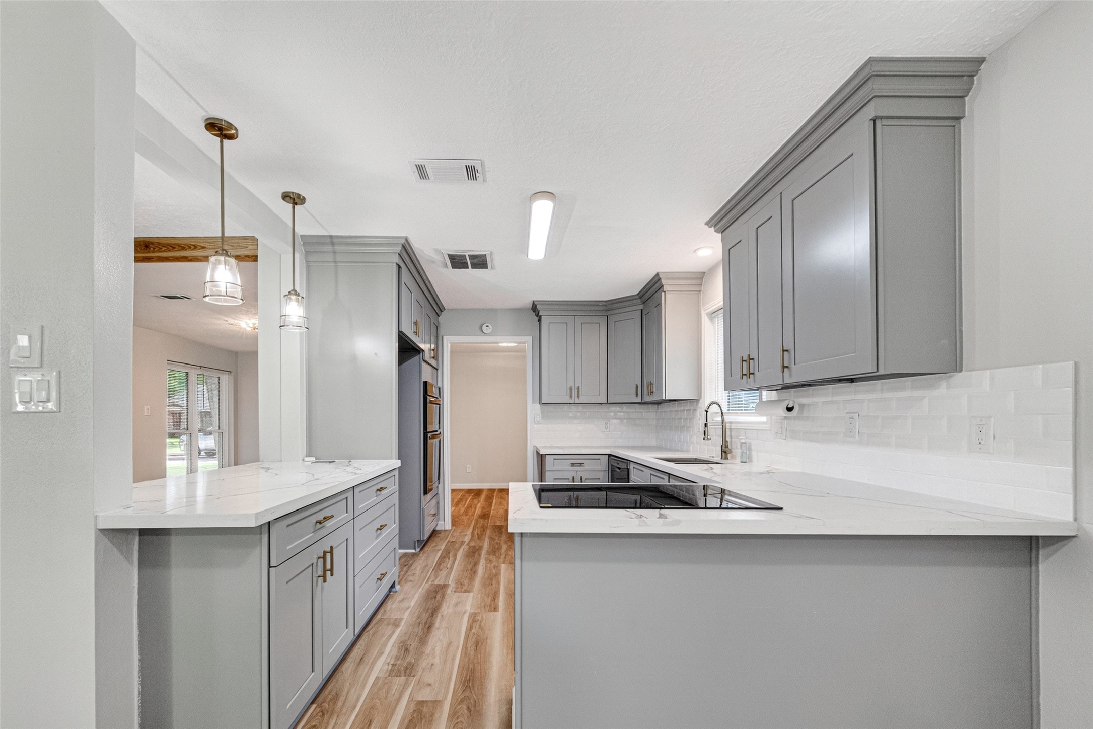25503 Foxbriar Lane Spring, TX 77373 - Photo 7 of 45 a kitchen with stainless steel appliances a sink stove and cabinets