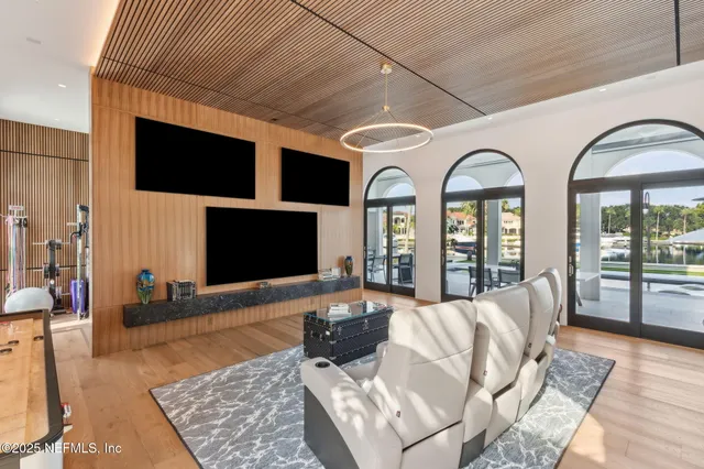 a spacious bathroom with a double vanity sink and a mirror