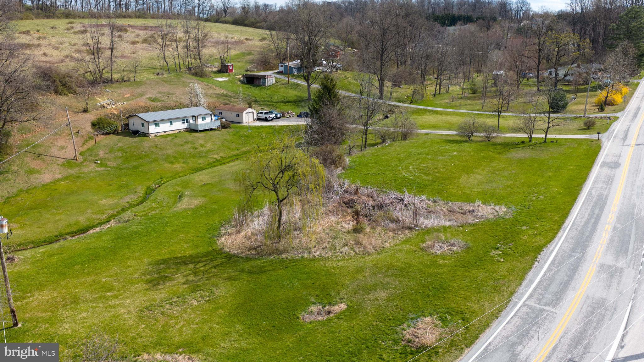 Lot 2 Valley Road Shrewsbury, PA 17361 - Photo 14 of 18 a view of a golf course with a lake