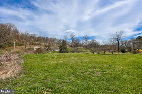 a view of an outdoor space and a yard