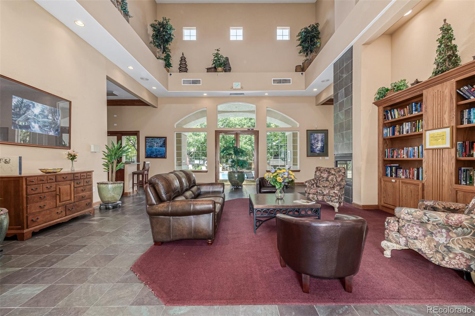 3976 Riviera Grove, Unit 203 Colorado Springs, CO 80922 - Photo 19 of 22 a living room with furniture and a large window
