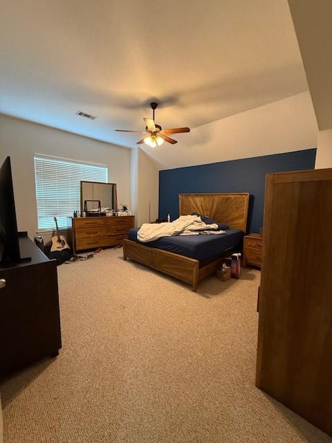 2513 South 2nd Street, Unit 3 Waco, TX 76706 - Photo 29 of 35 a bedroom with furniture and a flat screen tv
