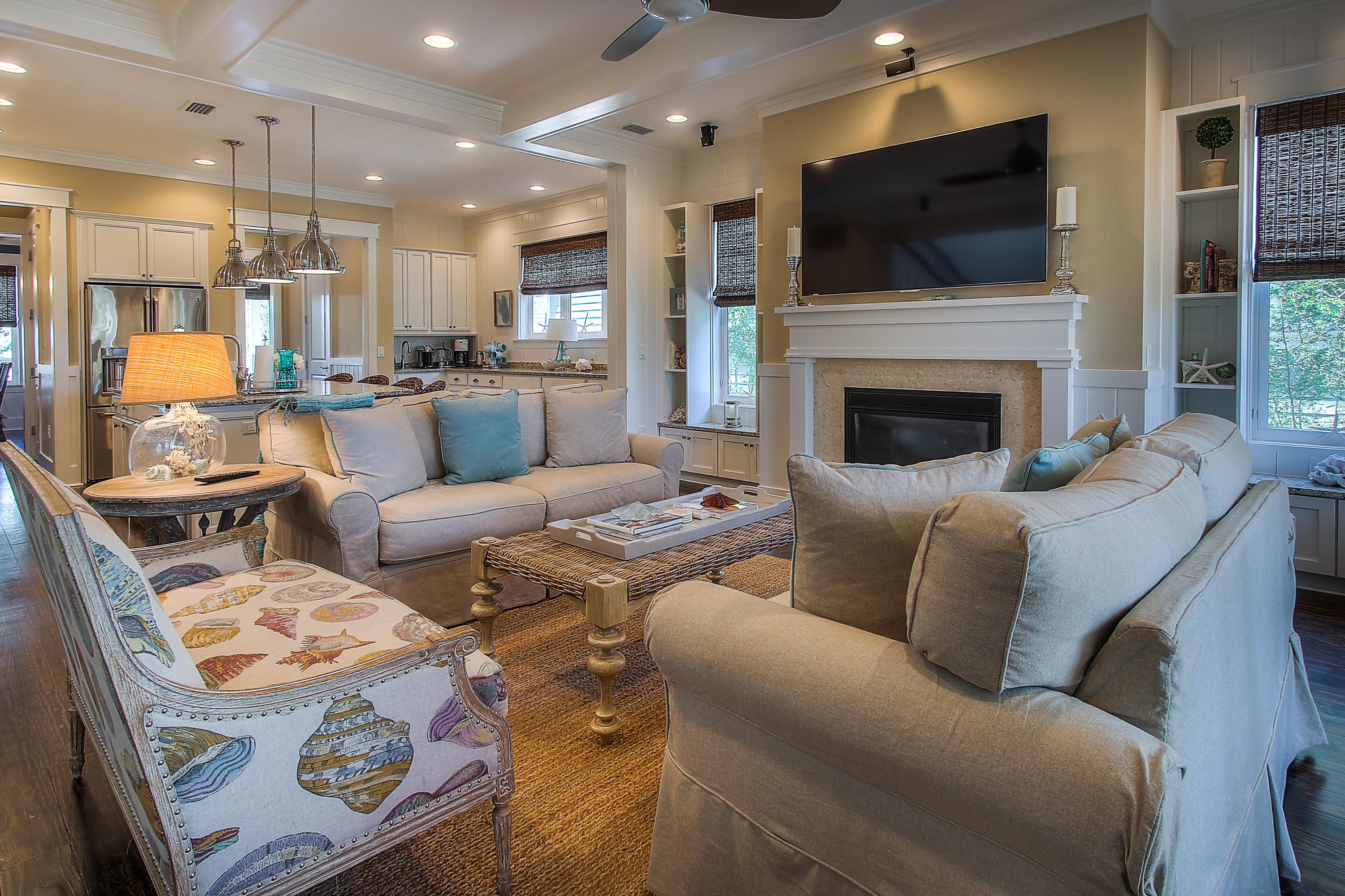 65 Flatwoods Forest Loop Santa Rosa Beach, FL 32459 - Photo 13 of 51 a living room with furniture a flat screen tv and a fireplace
