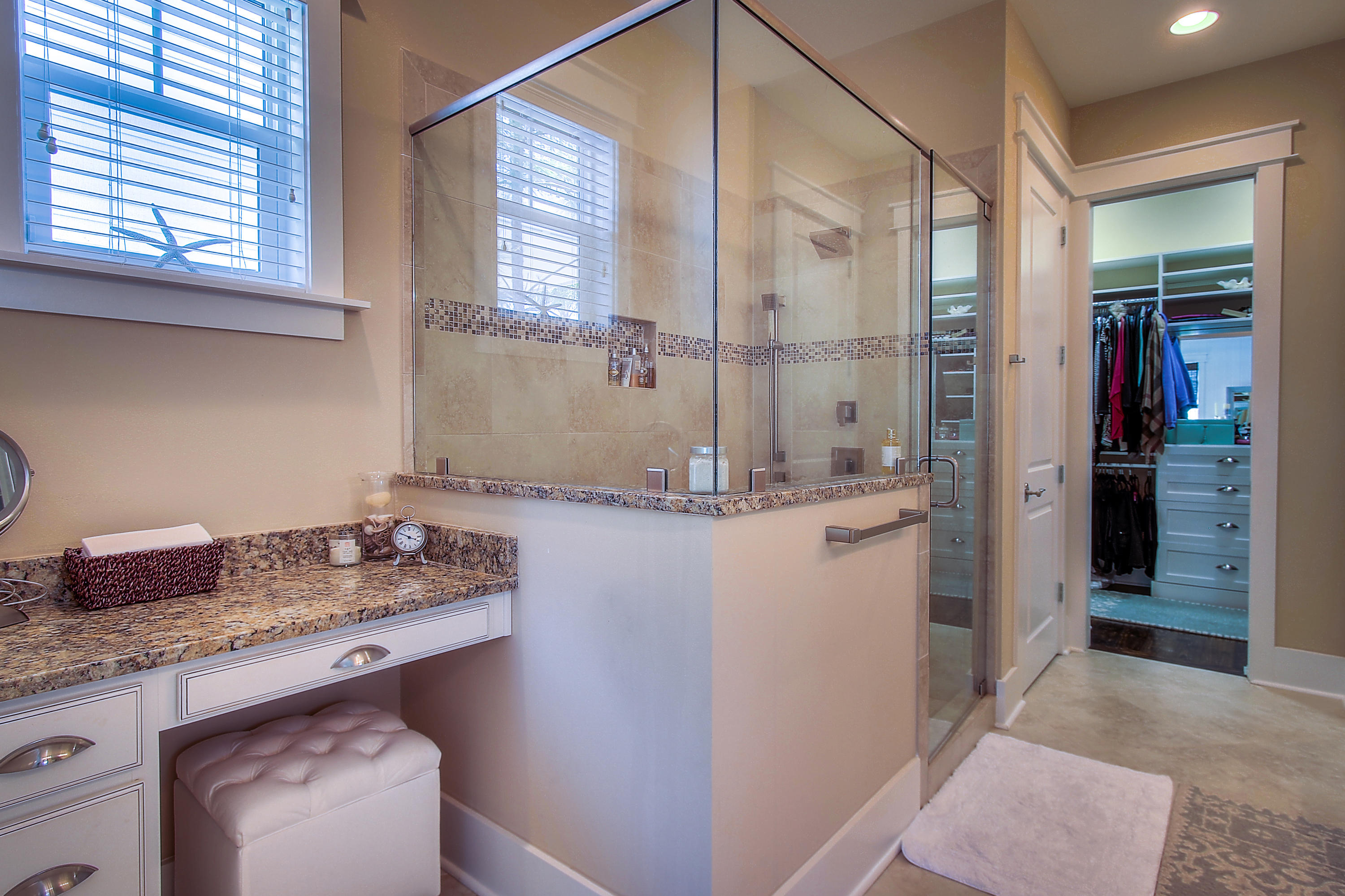 65 Flatwoods Forest Loop Santa Rosa Beach, FL 32459 - Photo 18 of 51 a bathroom with a granite countertop sink a mirror and shower