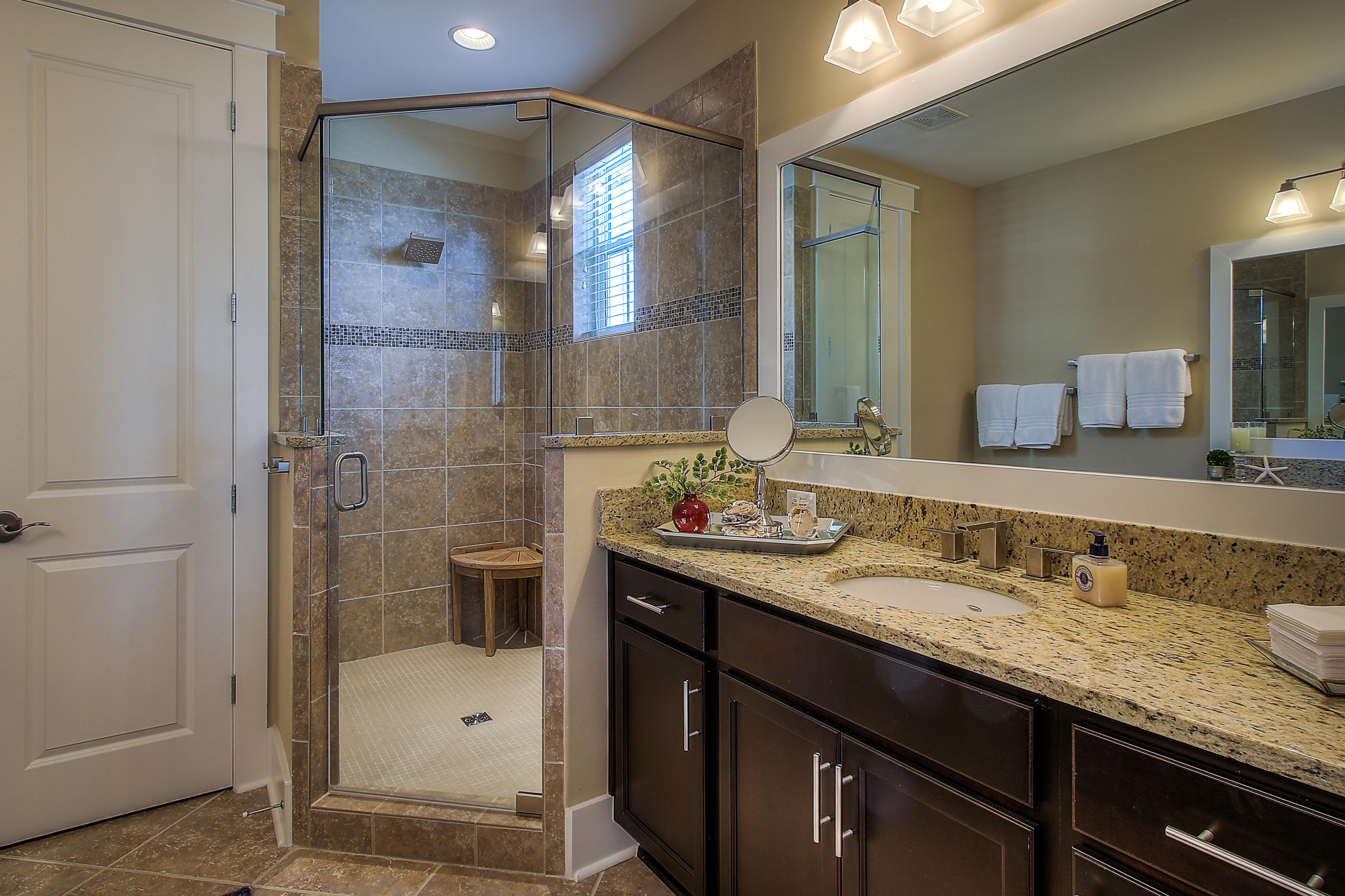 65 Flatwoods Forest Loop Santa Rosa Beach, FL 32459 - Photo 26 of 51 a bathroom with a granite countertop sink a toilet and shower