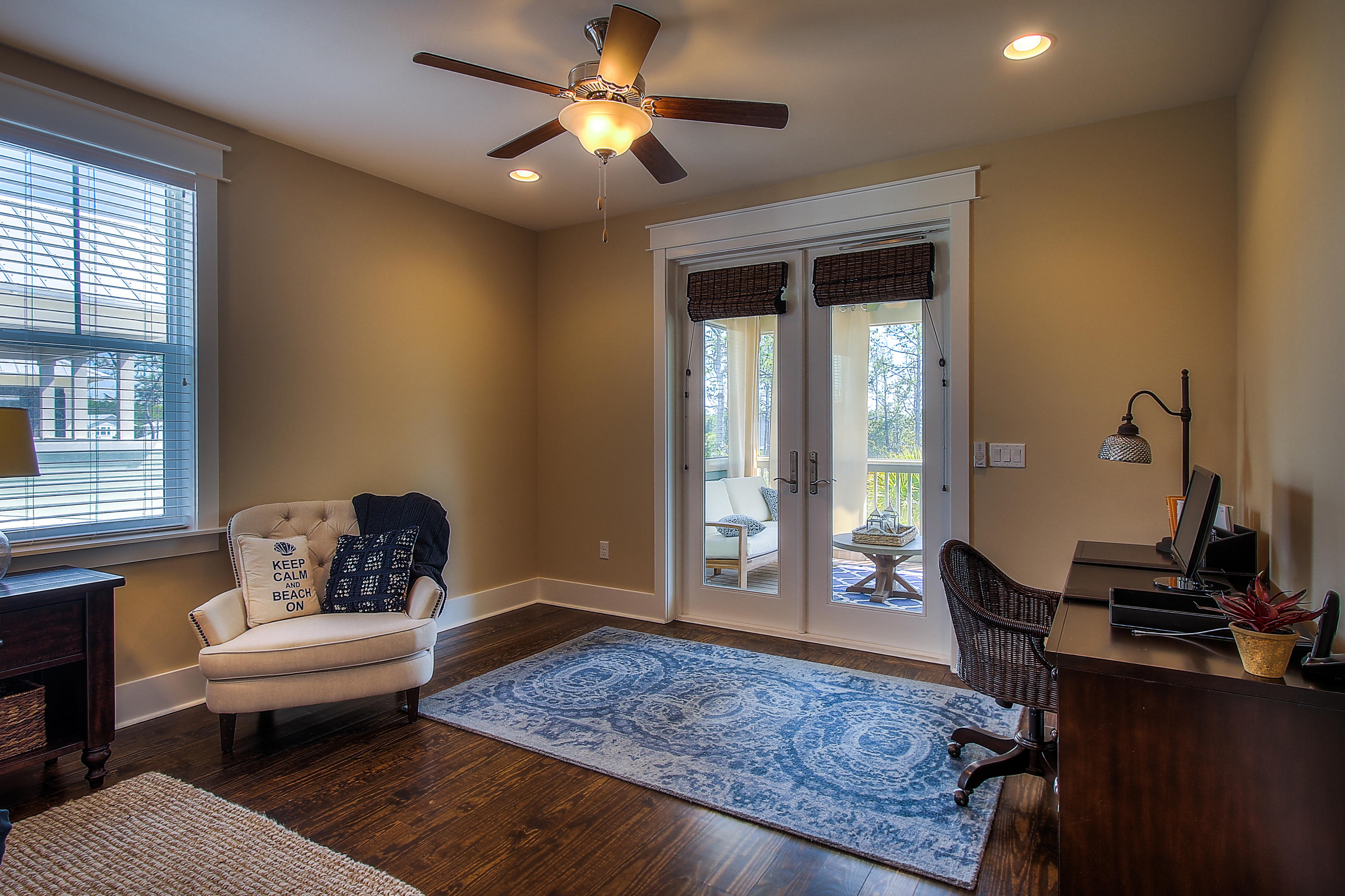 65 Flatwoods Forest Loop Santa Rosa Beach, FL 32459 - Photo 27 of 51 a living room with furniture and a window