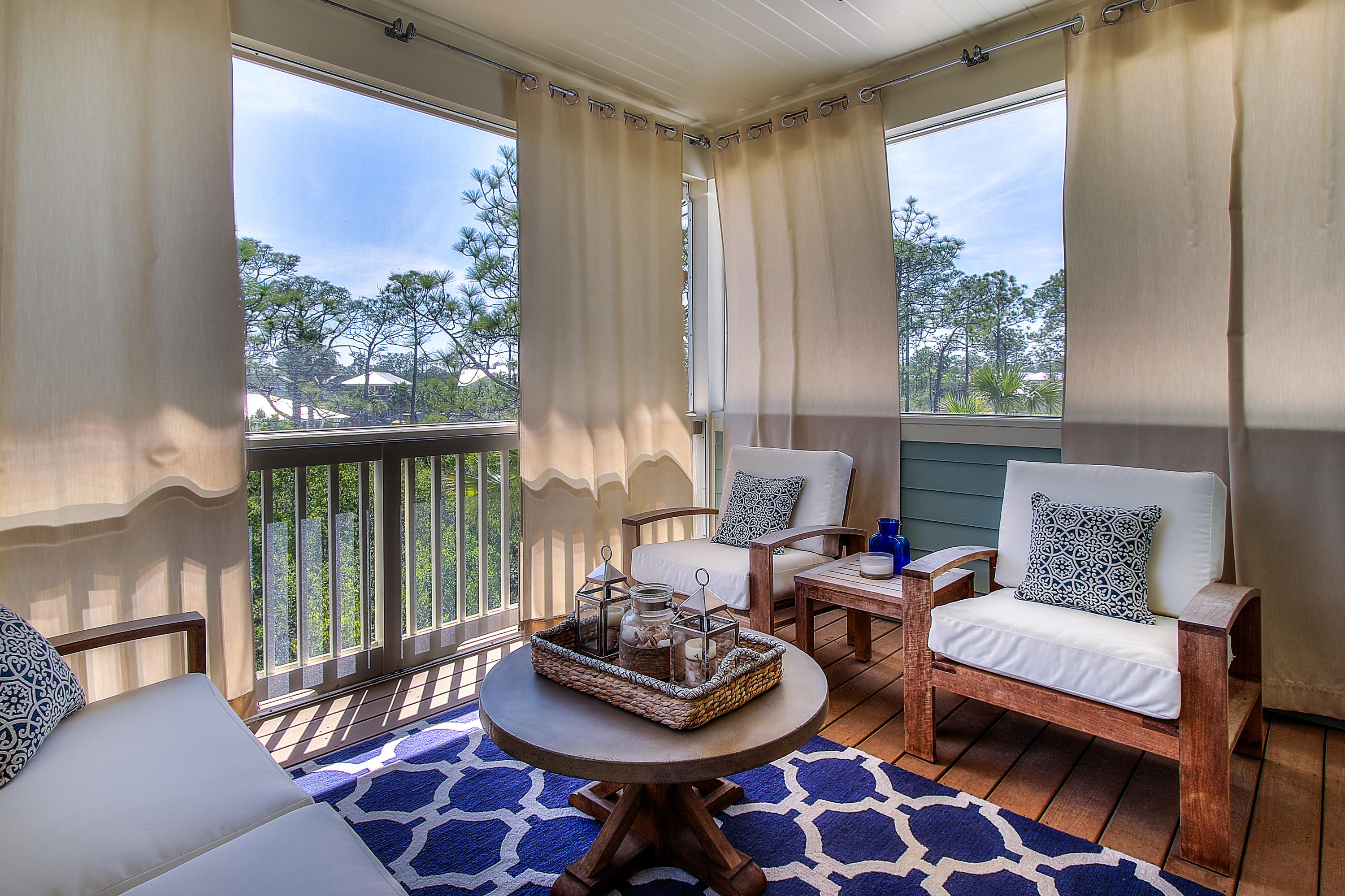 65 Flatwoods Forest Loop Santa Rosa Beach, FL 32459 - Photo 28 of 51 a living room with furniture and a large window