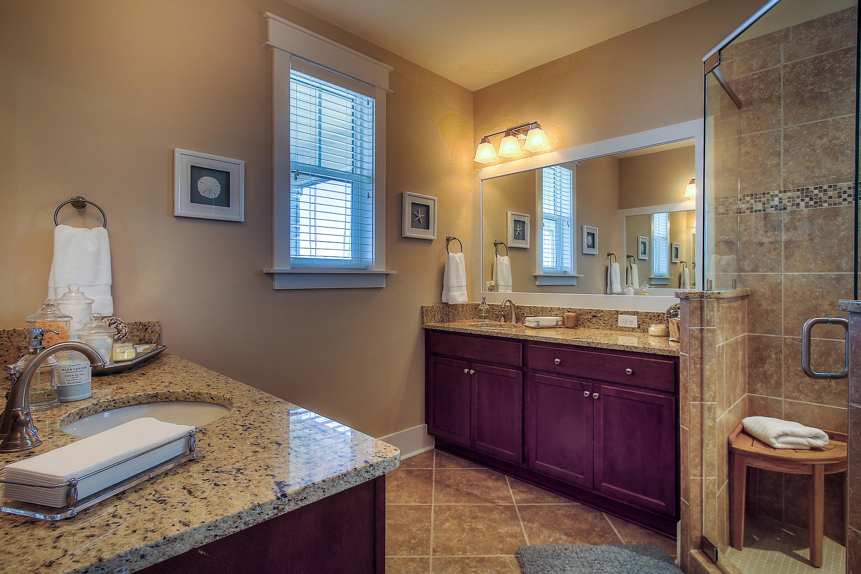 65 Flatwoods Forest Loop Santa Rosa Beach, FL 32459 - Photo 30 of 51 a bathroom with a granite countertop sink and a mirror