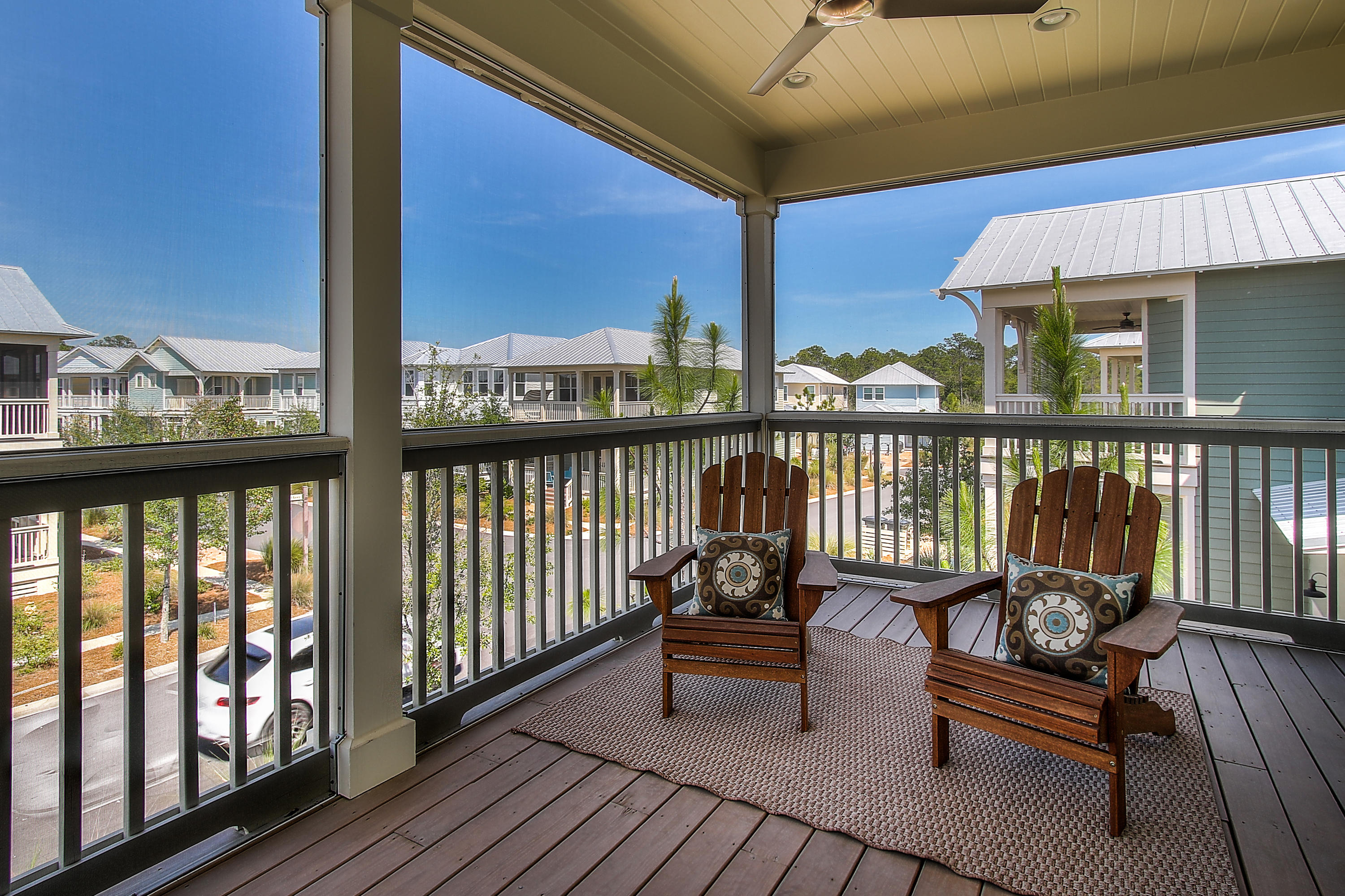 65 Flatwoods Forest Loop Santa Rosa Beach, FL 32459 - Photo 31 of 51 a view of a balcony with chairs