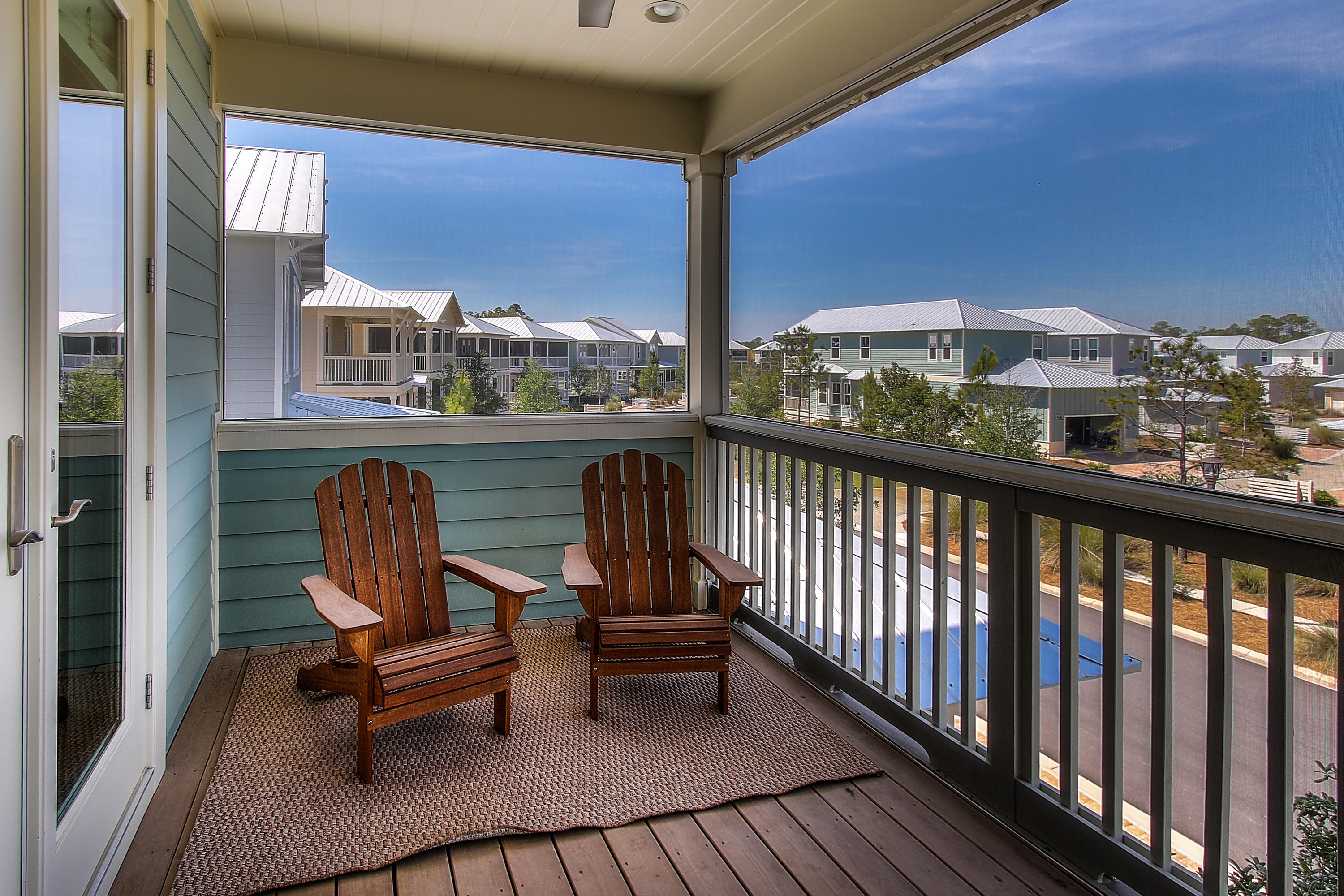 65 Flatwoods Forest Loop Santa Rosa Beach, FL 32459 - Photo 32 of 51 a view of a chairs in balcony