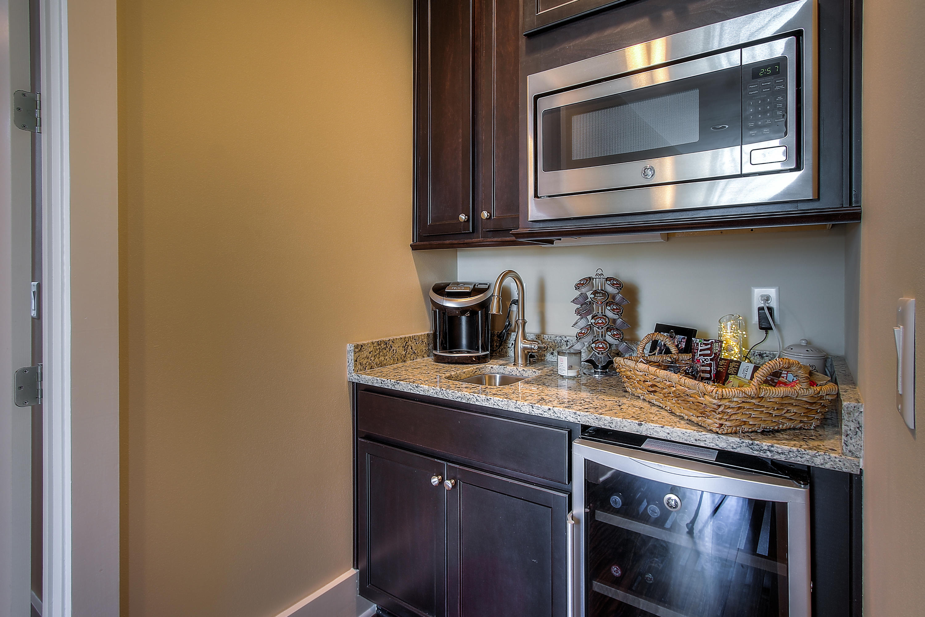 65 Flatwoods Forest Loop Santa Rosa Beach, FL 32459 - Photo 33 of 51 a kitchen with stainless steel appliances granite countertop a stove microwave and sink