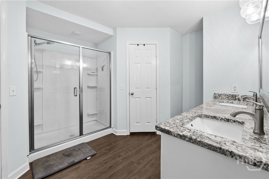 2869 Rincon-Stillwell Road Rincon, GA 31326 - Photo 26 of 40 Primary bath with standup shower and his and hers closets!